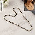 Gold-tone oval necklace
